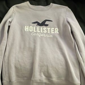 Hollister purple crewneck with the words “California” under the logo